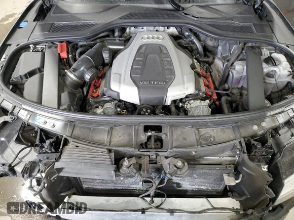 2015 Audi A8 z VIN WAUJGAFDXFN008499, wystawiony jako Copart lot #87658385 z przebiegiem 103 175 mil mil oraz Szkoda całkowita • Salvage title. Historia ofert i sprzedaży dostępna na DreamBid. Obrazek 11.