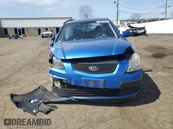 2009 Kia Rio LX with VIN KNADE243296500963, listed as a Copart auction lot 51061595 with 76,596 mi miles and Salvage Title. Bid and sale history available at carsss.com. Image 5.