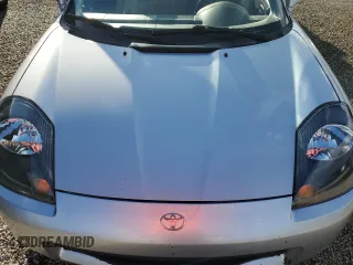 2001 Toyota MR2 z VIN JTDFR320410036287, wystawiony jako Copart lot #73851984 z przebiegiem Nie podano mil oraz Szkody całkowita. Historia ofert i sprzedaży dostępna na DreamBid. Obrazek 11.