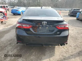 2023 Toyota Camry SE with VIN 4T1G11AK2PU735630, listed as a Copart auction lot 47280475 with 61,180 mi miles and Salvage Title. Bid and sale history available at DreamBid. Image 6.
