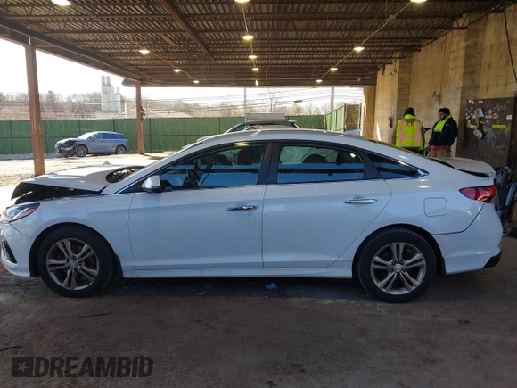 2019 Hyundai Sonata SEL with VIN 5NPE34AF2KH806872, listed as a IAAI auction lot 41825437 with 103,281 mi miles and . Bid and sale history available at DreamBid. Image 14.
