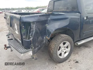2007 Nissan Titan XE with VIN 1N6BA07AX7N236492, listed as a IAAI auction lot 41668602 with 205,028 mi miles. Bid and sale history available at carsss.com. Image 6.