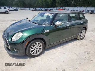 2016 MINI Clubman z VIN WMWLN5C5XG2E29275, wystawiony jako Copart lot #68162014 z przebiegiem 79 754 mil mil oraz Nie do naprawy. Historia ofert i sprzedaży dostępna na DreamBid. Obrazek 1.