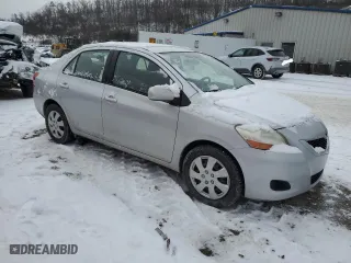 2011 Toyota Yaris with VIN JTDBT4K37B1401590, listed as a Copart auction lot 46142555 with 165,082 mi miles and Salvage Title. Bid and sale history available at carsss.com. Image 4.
