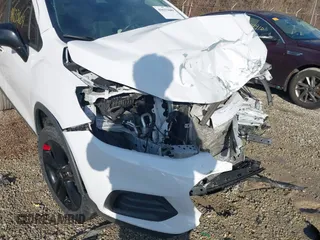2019 Chevrolet Trax LT z VIN 3GNCJLSB6KL265660, wystawiony jako IAAI lot #41633609 z przebiegiem Nie podano mil oraz . Historia ofert i sprzedaży dostępna na DreamBid. Obrazek 17.