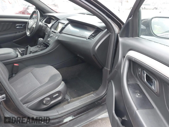 2014 Ford Taurus SEL z VIN 1FAHP2E85EG121636, wystawiony jako IAAI lot #41036886 z przebiegiem 117 460 mil mil oraz . Historia ofert i sprzedaży dostępna na DreamBid. Obrazek 5.