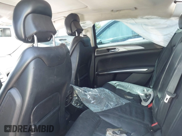 2016 Lincoln MKZ Hybrid z VIN 3LN6L2LU5GR613636, wystawiony jako IAAI lot #42613605 z przebiegiem Nie podano mil oraz . Historia ofert i sprzedaży dostępna na DreamBid. Obrazek 14.