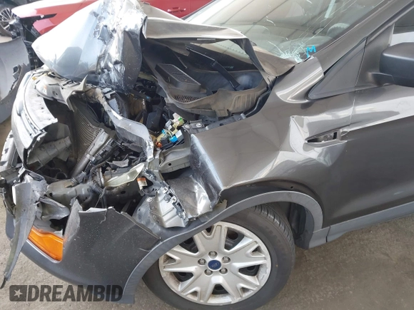 2015 Ford Escape S with VIN 1FMCU0F74FUB81395, listed as a IAAI auction lot 42122007 with 156,736 mi miles and . Bid and sale history available at DreamBid. Image 12.