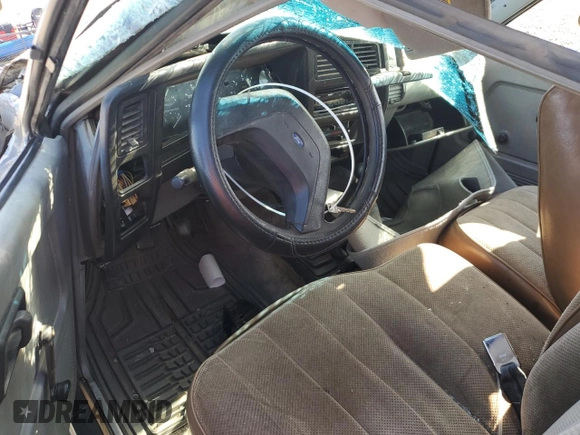 1989 Ford Bronco with VIN 1FMCU14T0KUA33910, listed as a Copart auction lot 57730195 with 53,335 mi miles and Salvage title. Bid and sale history available at DreamBid. Image 8.