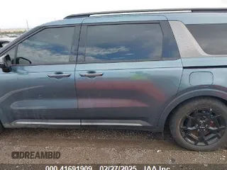 2025 Kia Carnival SX Prestige with VIN KNDNE5K32S6453595, listed as a IAAI auction lot 41691909 with 6,376 mi miles and . Bid and sale history available at carsss.com. Image 15.