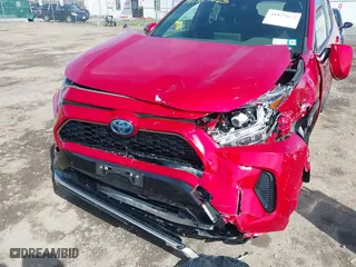 2021 Toyota RAV4 Prime SE with VIN JTMAB3FV2MD059200, listed as a IAAI auction lot 41957023 with 27,451 mi miles. Bid and sale history available at carsss.com. Image 6.