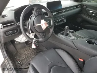 2023 Toyota GR Supra 3.0 with VIN WZ1DB0G06PW057166, listed as a Copart auction lot 52355784 with 0 mi miles and Salvage Title. Bid and sale history available at carsss.com. Image 8.