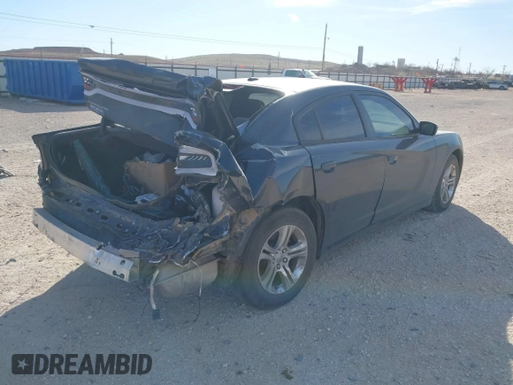 2019 Dodge Charger SXT with VIN 2C3CDXBG2KH658121, listed as a IAAI auction lot 41781901 with 125,634 mi miles. Bid and sale history available at carsss.com. Image 4.