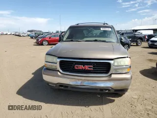2003 GMC Yukon SLT with VIN 1GKEK13Z43R219290, listed as a Copart auction lot 69303144 with 299,023 mi miles and Salvage Title. Bid and sale history available at carsss.com. Image 5.