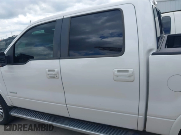 2011 Ford F-150 XLT with VIN 1FTFW1CT7BFA59275, listed as a IAAI auction lot 42111709 with 203,718 mi miles. Bid and sale history available at carsss.com. Image 14.
