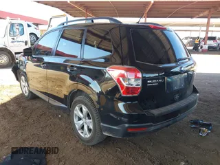 2015 Subaru Forester 2.5i Premium with VIN JF2SJADC8FG804998, listed as a IAAI auction lot 41885715 with 70,636 mi miles. Bid and sale history available at carsss.com. Image 3.