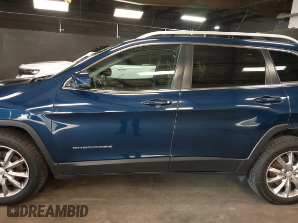 2018 Jeep Cherokee Limited with VIN 1C4PJMDXXJD611125, listed as a IAAI auction lot 41811985 with 148,956 mi miles. Bid and sale history available at carsss.com. Image 14.
