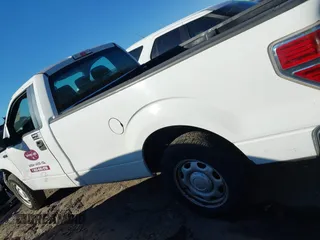 2013 Ford F-150 XL with VIN 1FTNF1CFXDKE78575, listed as a IAAI auction lot 41293852 with 201,332 mi miles. Bid and sale history available at carsss.com. Image 14.