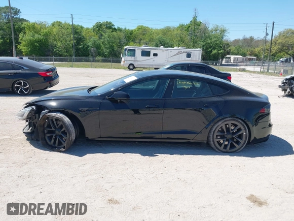 2021 Tesla Model S Plaid with VIN 5YJSA1E66MF452258, listed as a IAAI auction lot 41832000 with 42,845 mi miles and . Bid and sale history available at DreamBid. Image 15.