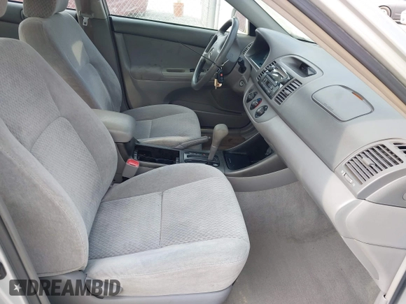 2004 Toyota Camry LE with VIN 4T1BE32K04U286257, listed as a IAAI auction lot 42079619 with 205,634 mi miles. Bid and sale history available at carsss.com. Image 5.