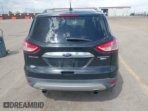 2014 Ford Escape Titanium with VIN 1FMCU9JX2EUB66579, listed as a IAAI auction lot 42171374 with 131,485 mi miles. Bid and sale history available at carsss.com. Image 16.