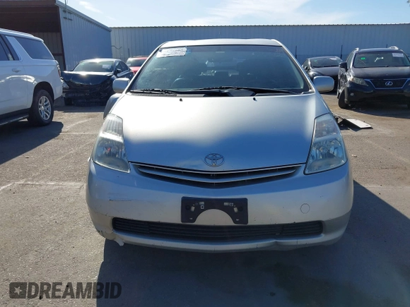 2005 Toyota Prius z VIN JTDKB20UX53080527, wystawiony jako IAAI lot #41831153 z przebiegiem 256 327 mil mil oraz . Historia ofert i sprzedaży dostępna na DreamBid. Obrazek 13.
