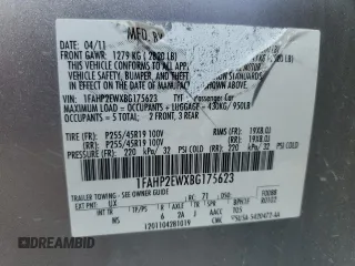 2011 Ford Taurus SEL with VIN 1FAHP2EWXBG175623, listed as a Copart auction lot 68707944 with 185,826 mi miles and Salvage Title. Bid and sale history available at DreamBid. Image 12.