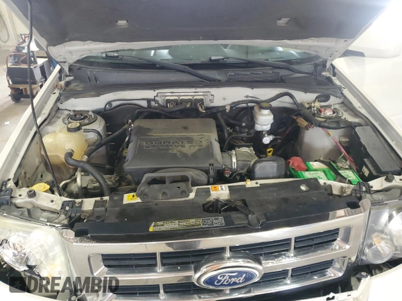 2010 Ford Escape Limited z VIN 1FMCU9EG4AKC43050, wystawiony jako Copart lot #60251495 z przebiegiem 174 550 mil mil oraz Szkoda całkowita • Salvage title. Historia ofert i sprzedaży dostępna na DreamBid. Obrazek 12.