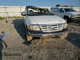 2000 Ford F-150 XL with VIN 1FTZF1727YKB49797, listed as a Copart auction lot 62154595 with Not provided miles and Salvage title. Bid and sale history available at DreamBid. Image 12.