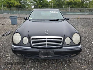 1999 Mercedes-Benz E-Class with VIN WDBJF65H9XA929577, listed as a Copart auction lot 71932364 with 84,806 mi miles and Salvage Title. Bid and sale history available at carsss.com. Image 5.