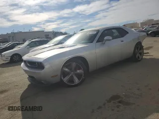 2010 Dodge Challenger SRT-8 with VIN 2B3CJ7DW4AH318204, listed as a Copart auction lot 86770904 with 91,830 mi miles and Salvage title. Bid and sale history available at DreamBid. Image 1.