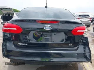 2018 Ford Focus SE with VIN 1FADP3F22JL311975, listed as a IAAI auction lot 41934856 with 68,974 mi miles. Bid and sale history available at carsss.com. Image 19.