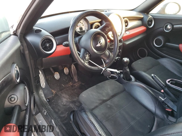 2013 MINI Coupe S z VIN WMWSX3C57DT408719, wystawiony jako Copart lot #75440574 z przebiegiem Nie podano mil oraz Szkoda całkowita • Salvage title. Historia ofert i sprzedaży dostępna na DreamBid. Obrazek 8.
