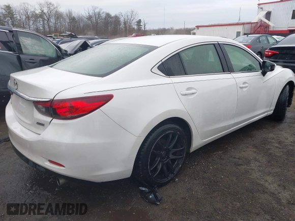 2015 Mazda 6 i Sport with VIN JM1GJ1U50F1220703, listed as a IAAI auction lot 41475129 with 127,834 mi miles. Bid and sale history available at carsss.com. Image 4.