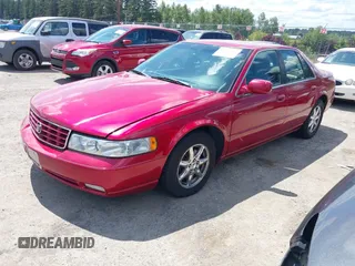 2002 Cadillac Seville Luxury SLS z VIN 1G6KS54Y52U304911, wystawiony jako IAAI lot #42333307 z przebiegiem 123 284 mil mil oraz . Historia ofert i sprzedaży dostępna na DreamBid. Obrazek 2.