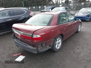 1999 Cadillac Catera z VIN W06VR52R0XR144059, wystawiony jako IAAI lot #41921629 z przebiegiem 80 937 mil mil oraz . Historia ofert i sprzedaży dostępna na DreamBid. Obrazek 4.