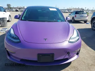 2020 Tesla Model 3 Standard Range Plus with VIN 5YJ3E1EA0LF739462, listed as a IAAI auction lot 42081889 with 65,254 mi miles. Bid and sale history available at carsss.com. Image 12.