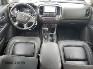 2021 GMC Canyon 4WD AT4 w/Leather with VIN 1GTG6FEN7M1149820, listed as a Copart auction lot 47602535 with 43,412 mi miles and Salvage Title. Bid and sale history available at carsss.com. Image 8.