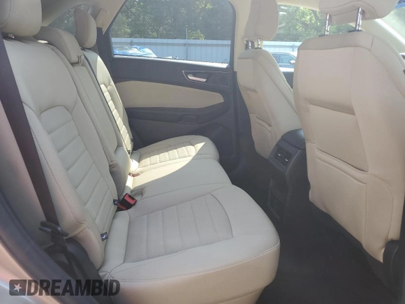 2020 Ford Edge SE z VIN 2FMPK4G91LBA02908, wystawiony jako Copart lot #59264195 z przebiegiem 22 581 mil mil oraz Szkoda całkowita • Salvage title. Historia ofert i sprzedaży dostępna na DreamBid. Obrazek 11.