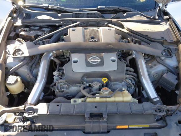 2014 Nissan 370Z Nismo with VIN JN1AZ4EHXEM634418, listed as a IAAI auction lot 41308580 with 84,074 mi miles and . Bid and sale history available at DreamBid. Image 10.