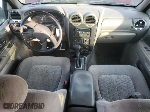 2004 GMC Envoy SLE with VIN 1GKDT13S342304711, listed as a Copart auction lot 44695385 with 129,804 mi miles and Salvage Title. Bid and sale history available at carsss.com. Image 8.