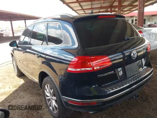 2016 Volkswagen Touareg Sport with VIN WVGEF9BP0GD012148, listed as a IAAI auction lot 42195030 with 95,984 mi miles and . Bid and sale history available at DreamBid. Image 3.