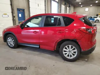 2016 Mazda CX-5 Touring z VIN JM3KE4CY7G0898598, wystawiony jako Copart lot #56717895 z przebiegiem 103 548 mil mil oraz Szkoda całkowita • Salvage title. Historia ofert i sprzedaży dostępna na DreamBid. Obrazek 2.