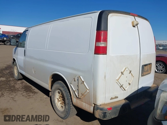 2014 Chevrolet Express Cargo Van with VIN 1GCWGFCAXE1205405, listed as a IAAI auction lot 41700218 with 397,332 mi miles. Bid and sale history available at carsss.com. Image 3.