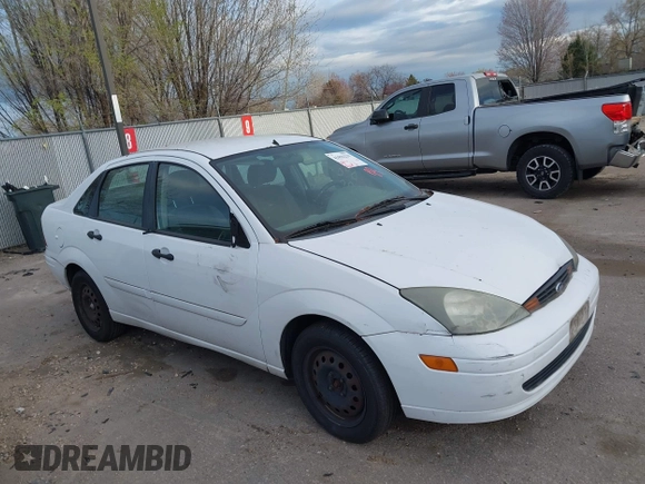 2004 Ford Focus SE with VIN 1FAFP34394W199845, listed as a IAAI auction lot 41896239 with 98,464 mi miles and . Bid and sale history available at DreamBid. Image 1.