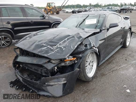 2022 Ford Mustang EcoBoost with VIN 1FA6P8TH2N5113664, listed as a IAAI auction lot 42314252 with 55,130 mi miles and . Bid and sale history available at DreamBid. Image 2.
