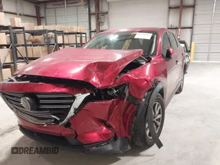 2019 Mazda CX-9 Touring with VIN JM3TCACY1K0331904, listed as a IAAI auction lot 42146945 with 77,699 mi miles and . Bid and sale history available at DreamBid. Image 6.