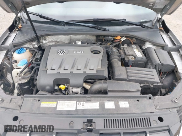 2014 Volkswagen Passat SE z VIN 1VWBN7A36EC045247, wystawiony jako IAAI lot #42295047 z przebiegiem 118 431 mil mil oraz . Historia ofert i sprzedaży dostępna na DreamBid. Obrazek 10.