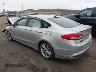 2018 Ford Fusion SE z VIN 3FA6P0LU3JR141401, wystawiony jako IAAI lot #41718444 z przebiegiem Nie podano mil oraz . Historia ofert i sprzedaży dostępna na DreamBid. Obrazek 3.
