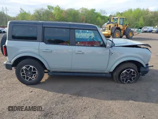 2023 Ford Bronco with VIN 1FMDE5BH3PLA90591, listed as a IAAI auction lot 42127867 with 34,616 mi miles and . Bid and sale history available at DreamBid. Image 13.